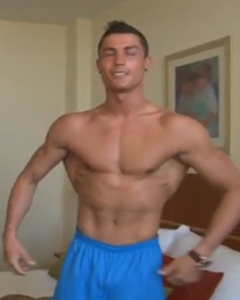 Cristiano Ronaldo shows off his bulky biceps as he works out in